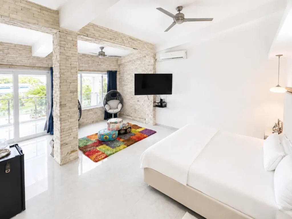 Private bedroom with natural light at Villa Palm Cay