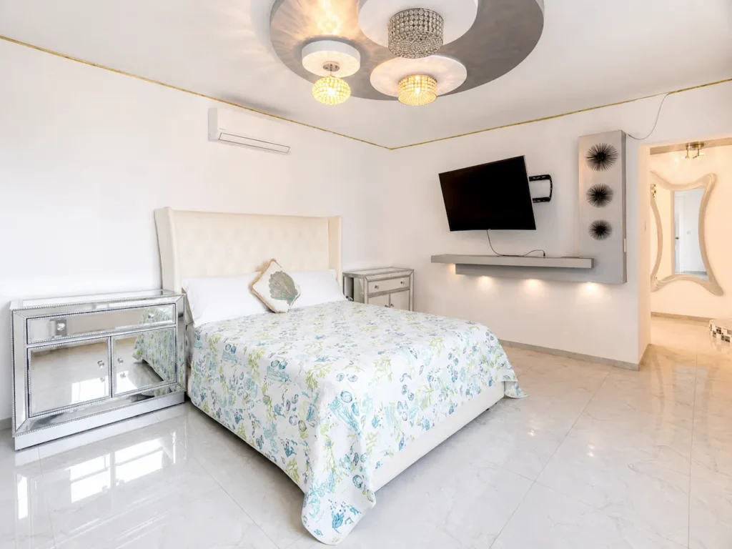 Guest bedroom inside Villa Palm Cay in Santa Fe