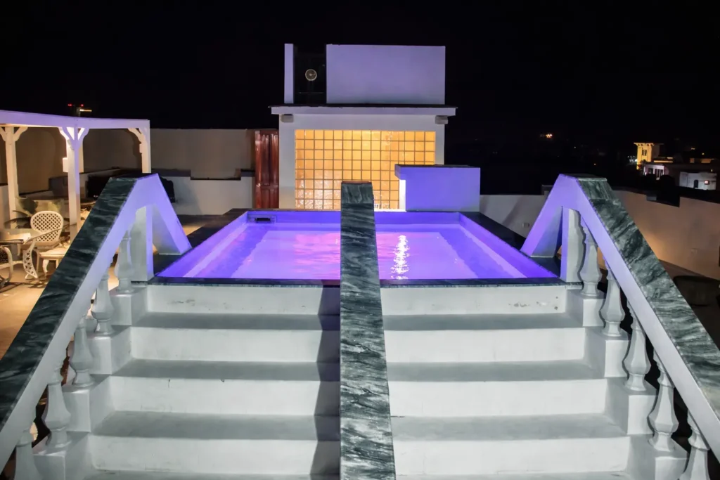 Upper terrace and illuminated plunge pool at Villa Pat