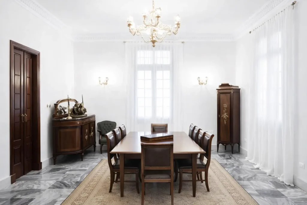 Bright formal dining room inside Villa Pat