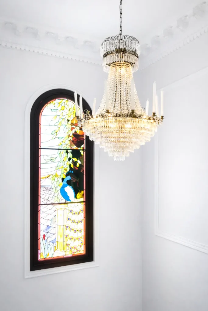 Decorative stained-glass window inside Villa Pat