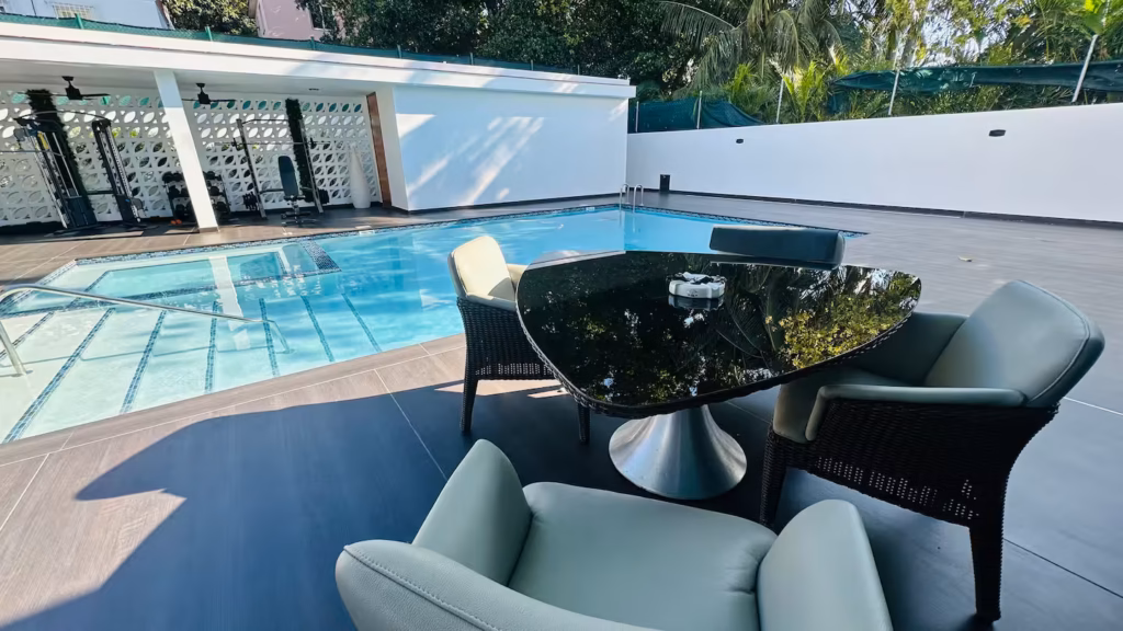 Private pool and outdoor seating at Villa Venezia