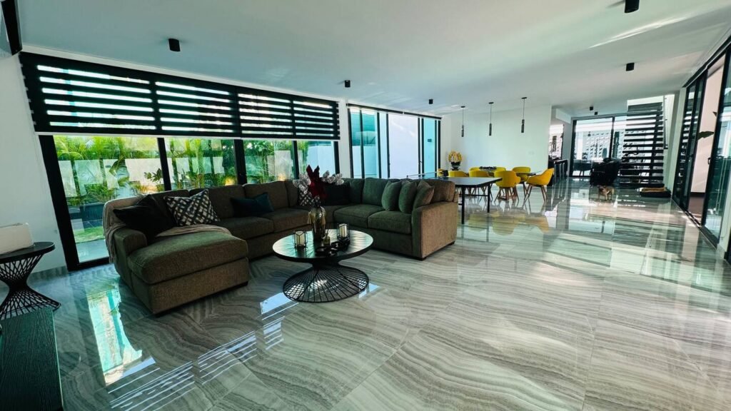Open-plan lounge and dining area inside Villa Venezia