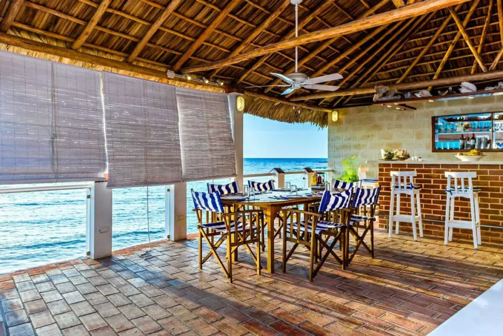 Covered seaside open-air pavilion and bar at Villa Yan