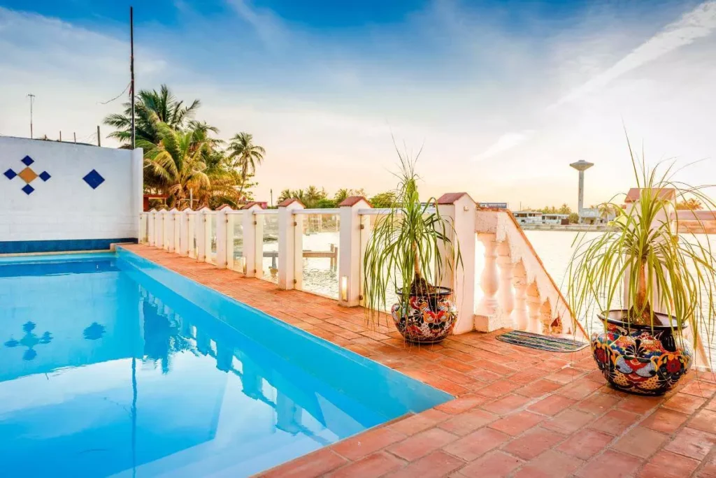 Long swimming pool terrace at Villa Yan in Havana